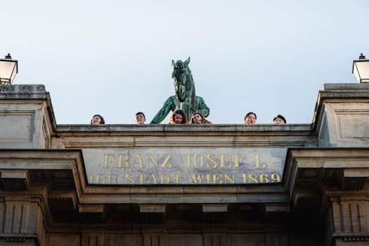 Top 5 Lenjerii Intime Damă: Review-uri și Ghidul de Alegere pentru 2024 2 Group of people enjoying the view from Franz Josef I statue in Vienna during sunset.